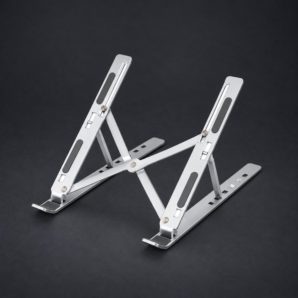 LIFT — Aluminum Laptop Stand on graphite studio background; styled visualization