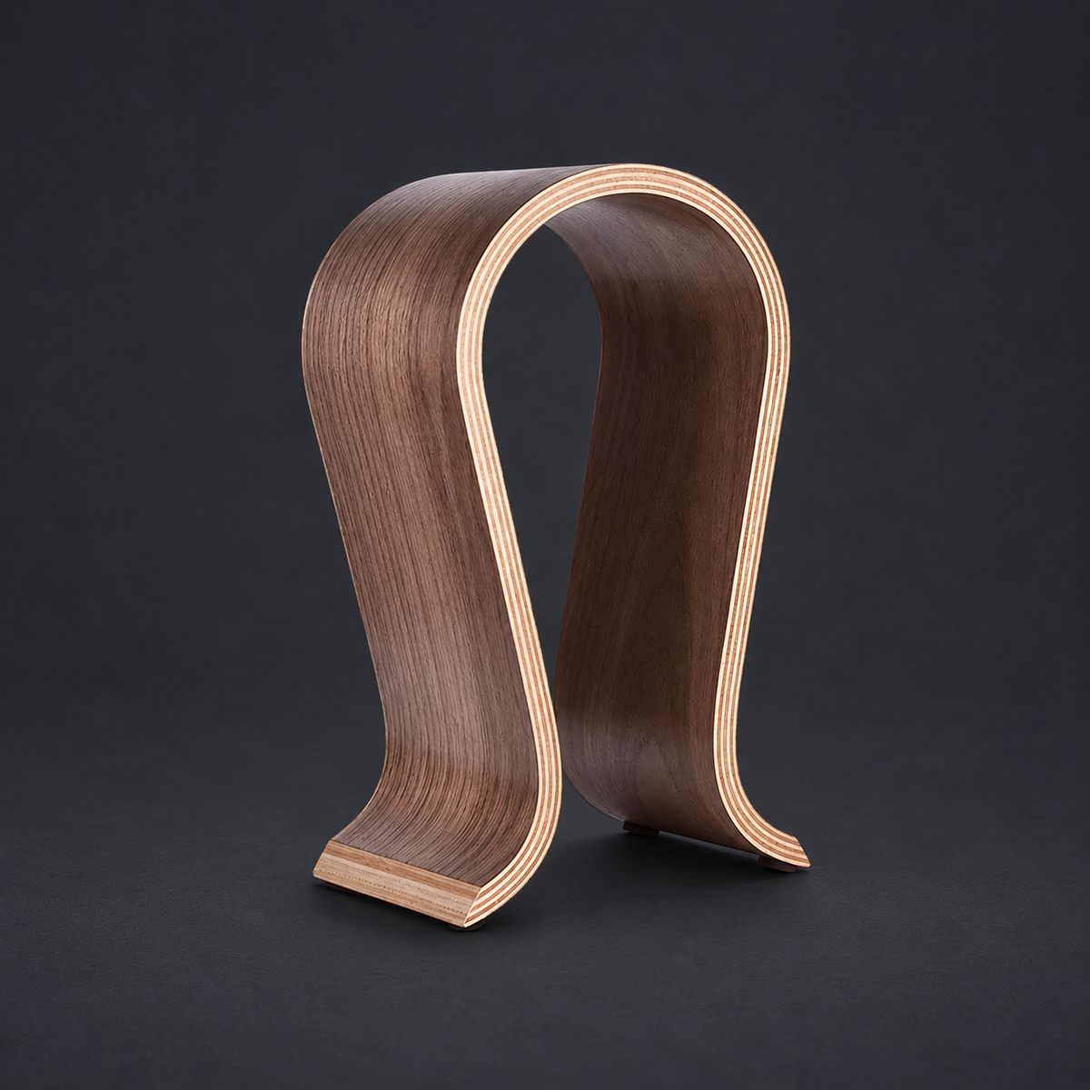 ARC — Walnut Headphone Stand on graphite studio background; styled visualization