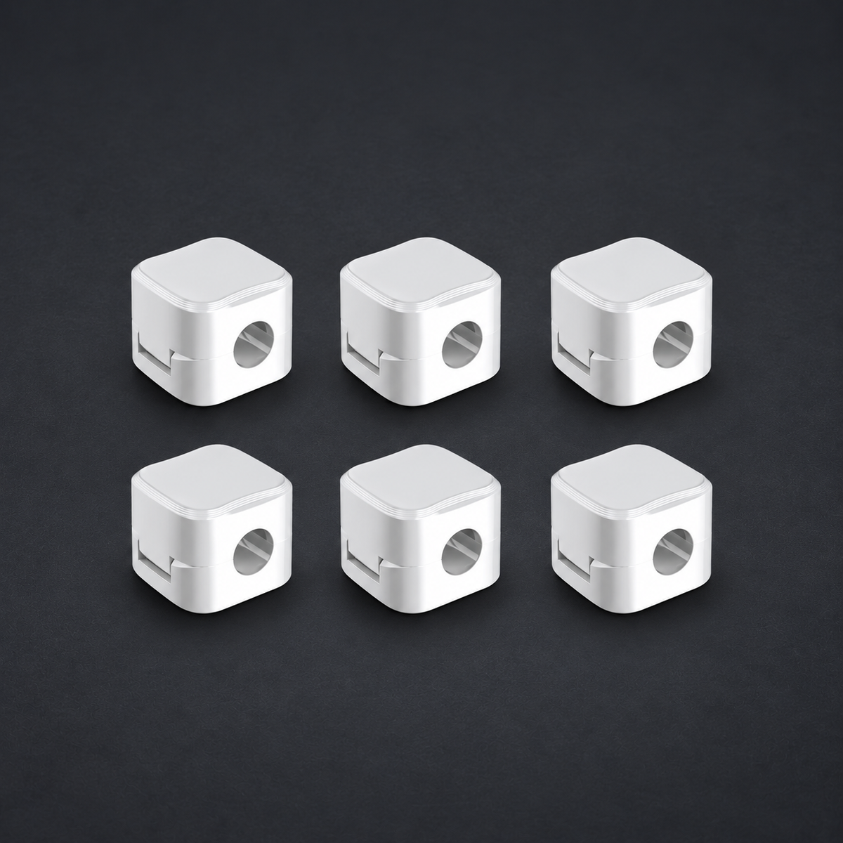 SNAP — Magnetic Cable Clips (6-pack) on graphite studio background; styled visualization