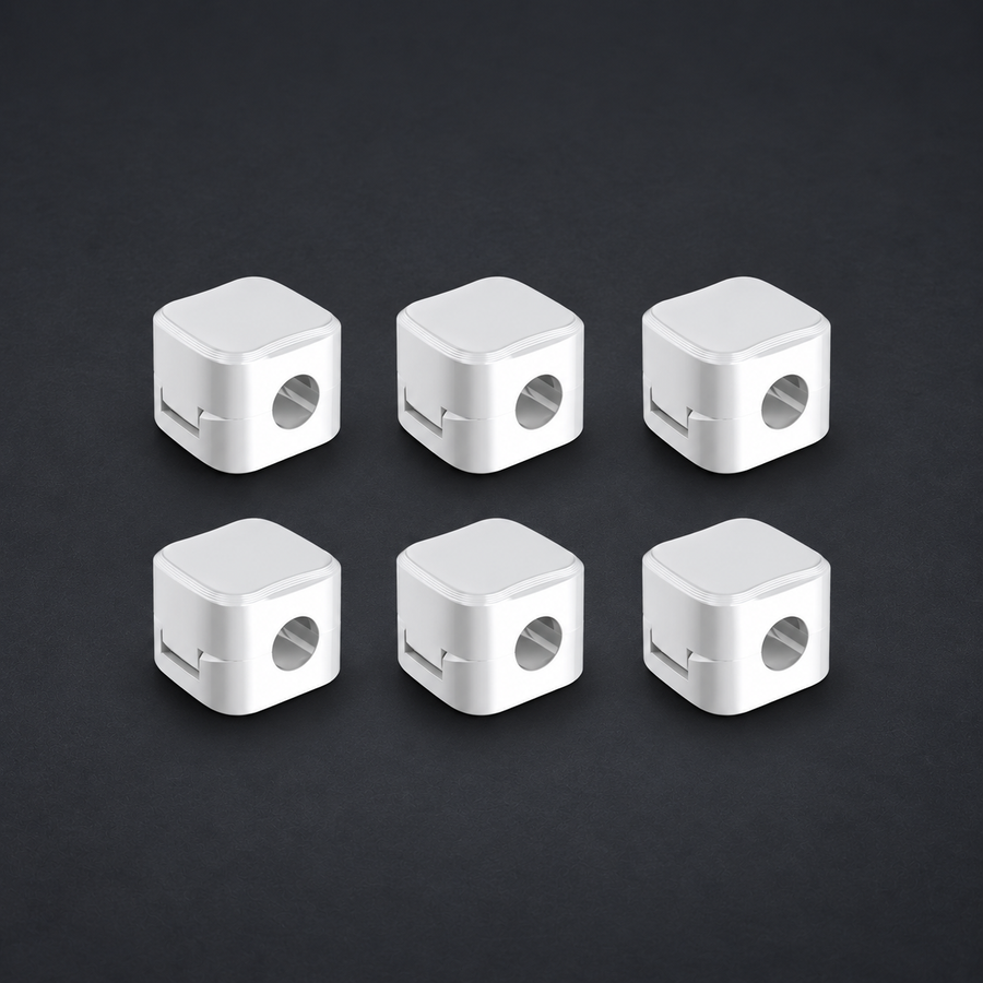 SNAP — Magnetic Cable Clips (6-pack) on graphite studio background; styled visualization