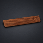 PALM — Walnut Keyboard Wrist Rest on graphite studio background; styled visualization