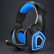 comms-headset-blue — logo-free graphite studio photo