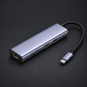 LINK 7-in-1 hub on graphite studio background; styled visualization with branding removed