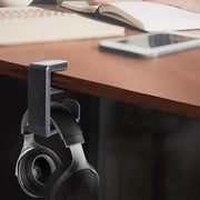 HANG under a wooden desk