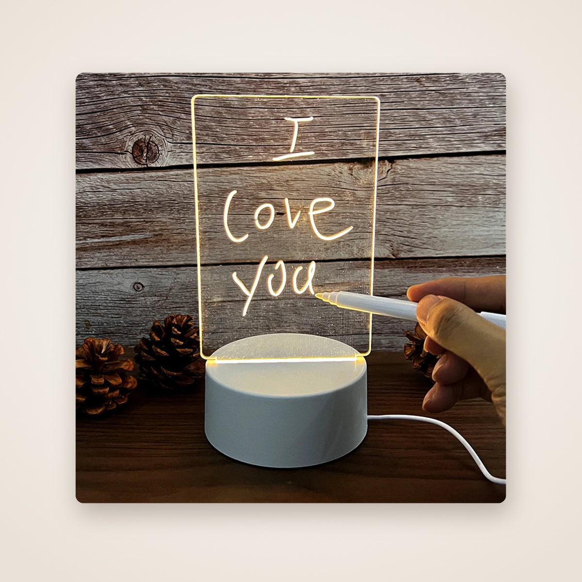 GLOWNOTE acrylic board with a handwritten glowing note