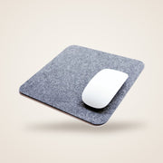 TILE felt mouse pad in grey with a mouse on it
