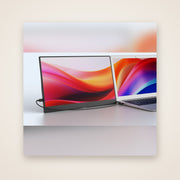TWIN portable monitor next to a laptop
