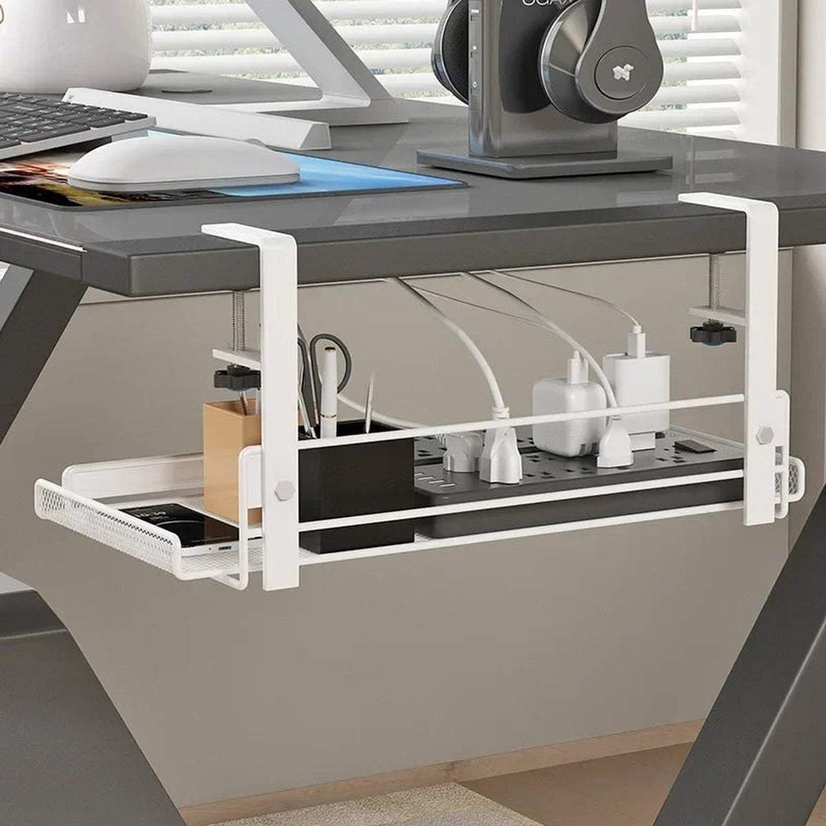 TRAY hiding a power strip under a grey desk