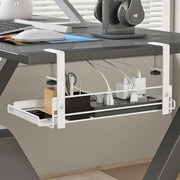 TRAY hiding a power strip under a grey desk